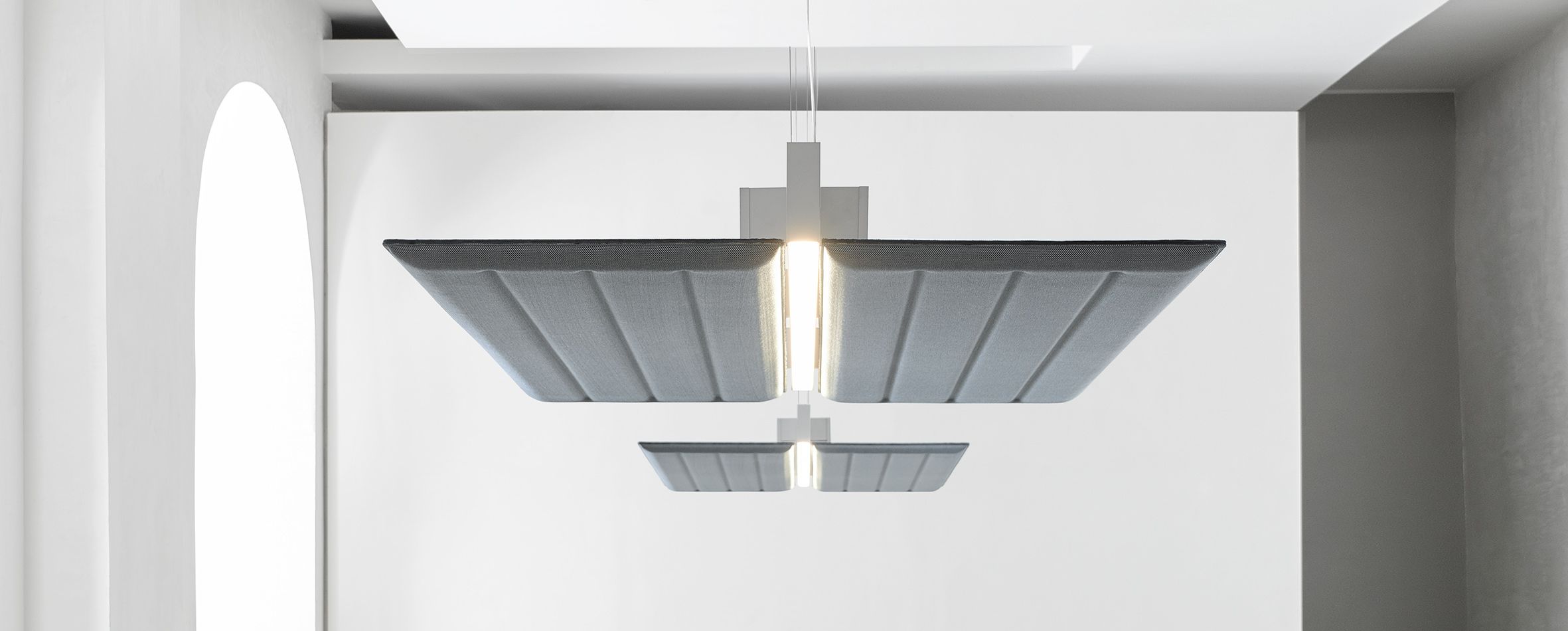 Diade lighting and sound absorption system by Monica Armani for Luceplan